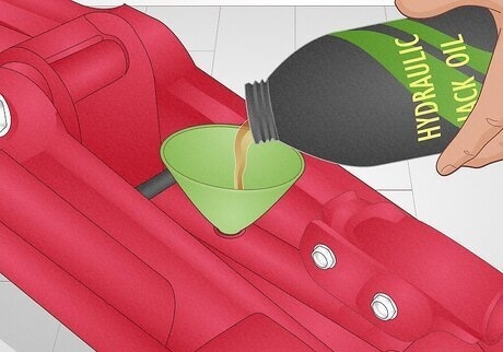 add oil to a bottle jack step